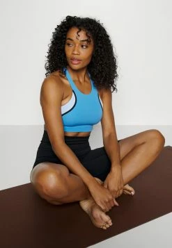 Nike Performance BRA - Medium Support Sports Bra - Coast/light Marine -Nike Performance store e0f7797536bb423c860b12c3de9fb432