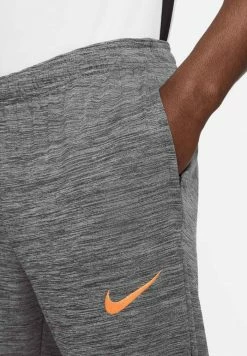 Nike Performance ACADEMY - Tracksuit Bottoms - Black/sunset Glow -Nike Performance store e4233c13066745608781f9b94905e5c4