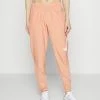 Nike Performance RUN PANT - Tracksuit Bottoms - Madder Root