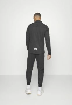Nike Performance Tracksuit Bottoms - Off Noir/black -Nike Performance store e69c3714da7c4acd85dee9c42a18a496