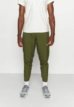 Nike Performance PANT - Tracksuit Bottoms - Rough Green