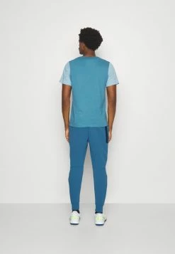 Nike Performance TOTTENHAM HOTSPURS TECH JOGGER - Club Wear - Riftblue/white -Nike Performance store eab9df6120e547b4838b85a0df01f297