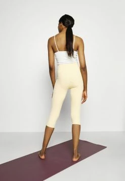 Nike Performance LUXE CAPRI - Leggings - Pale Vanilla/coconut Milk -Nike Performance store f2c8cbea8f6846c9857880bf5d898d85