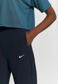 Nike Performance BLISS PANT - Tracksuit Bottoms - Black/white -Nike Performance store f6a46bdf86a04b5ca32cf3ff309a84fe