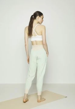 Nike Performance Tracksuit Bottoms - Sanddrift/mint Foam/grey Fog -Nike Performance store fbe5d70081d14f2596efbec5adf52dc5