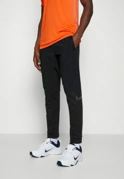 Nike Performance DRY PANT - Tracksuit Bottoms - Black/cinnabar